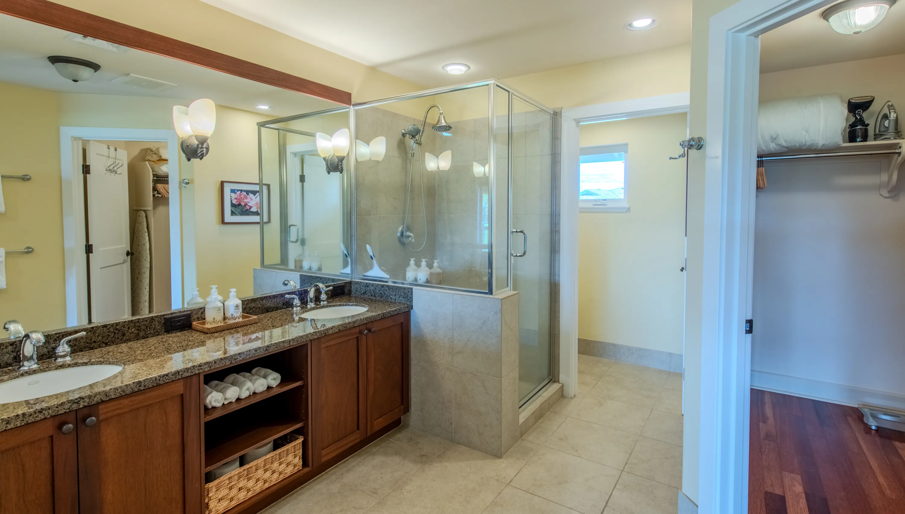 Ensuite bathroom with a double-sink vanity and glass walk-in shower