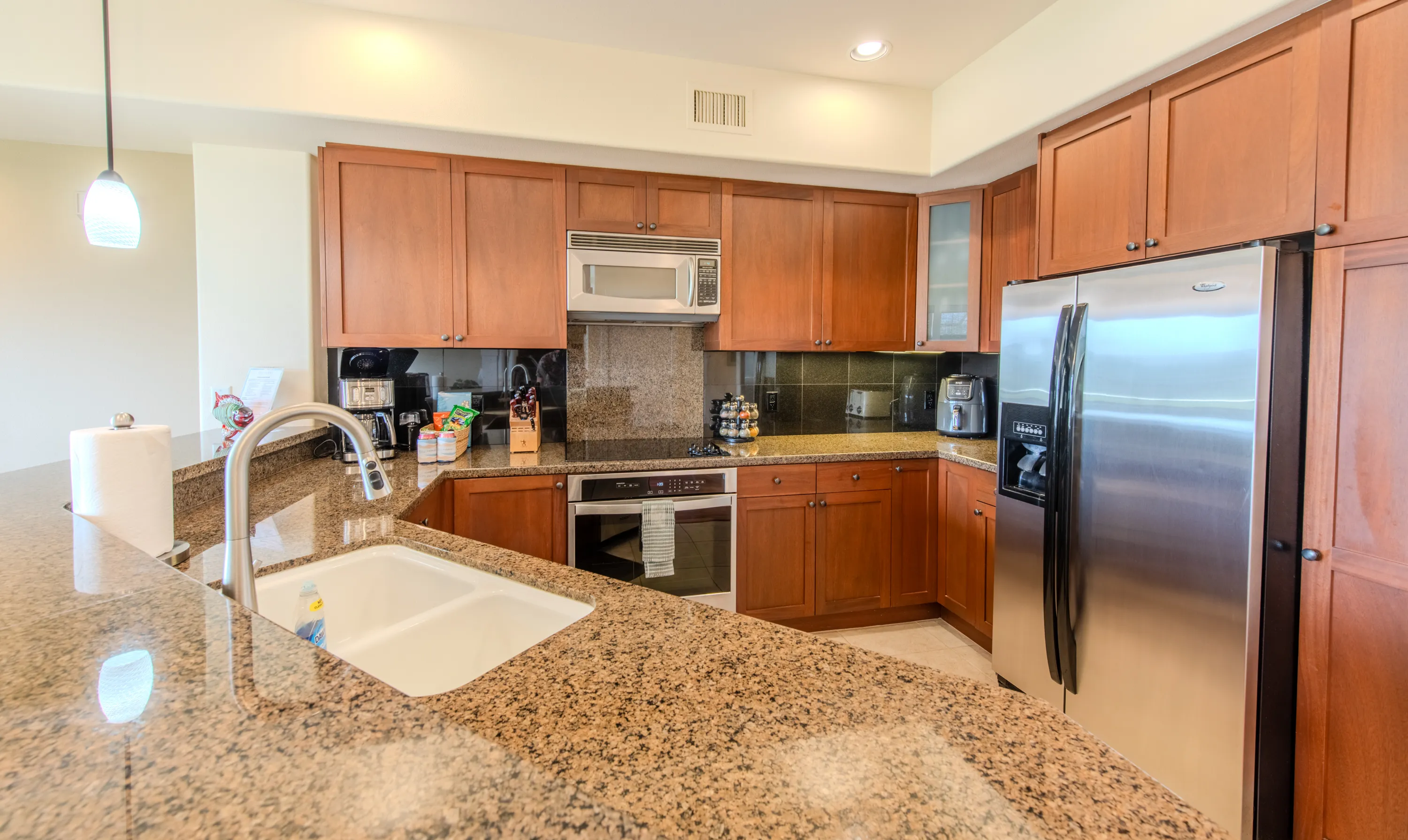Kitchen with granite counters and stainless steel appliances