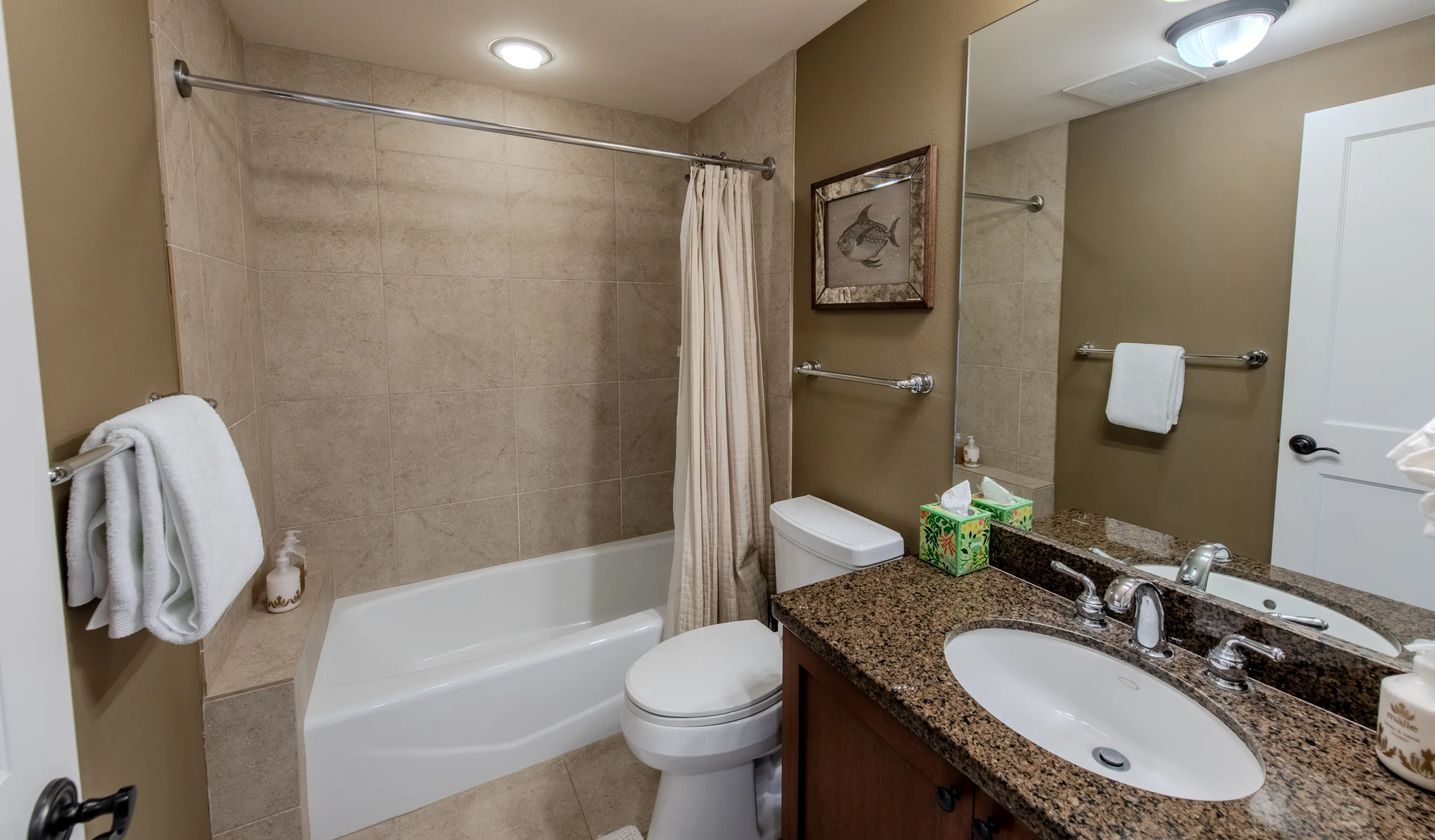 Bathroom with a soaking tub and shower combination