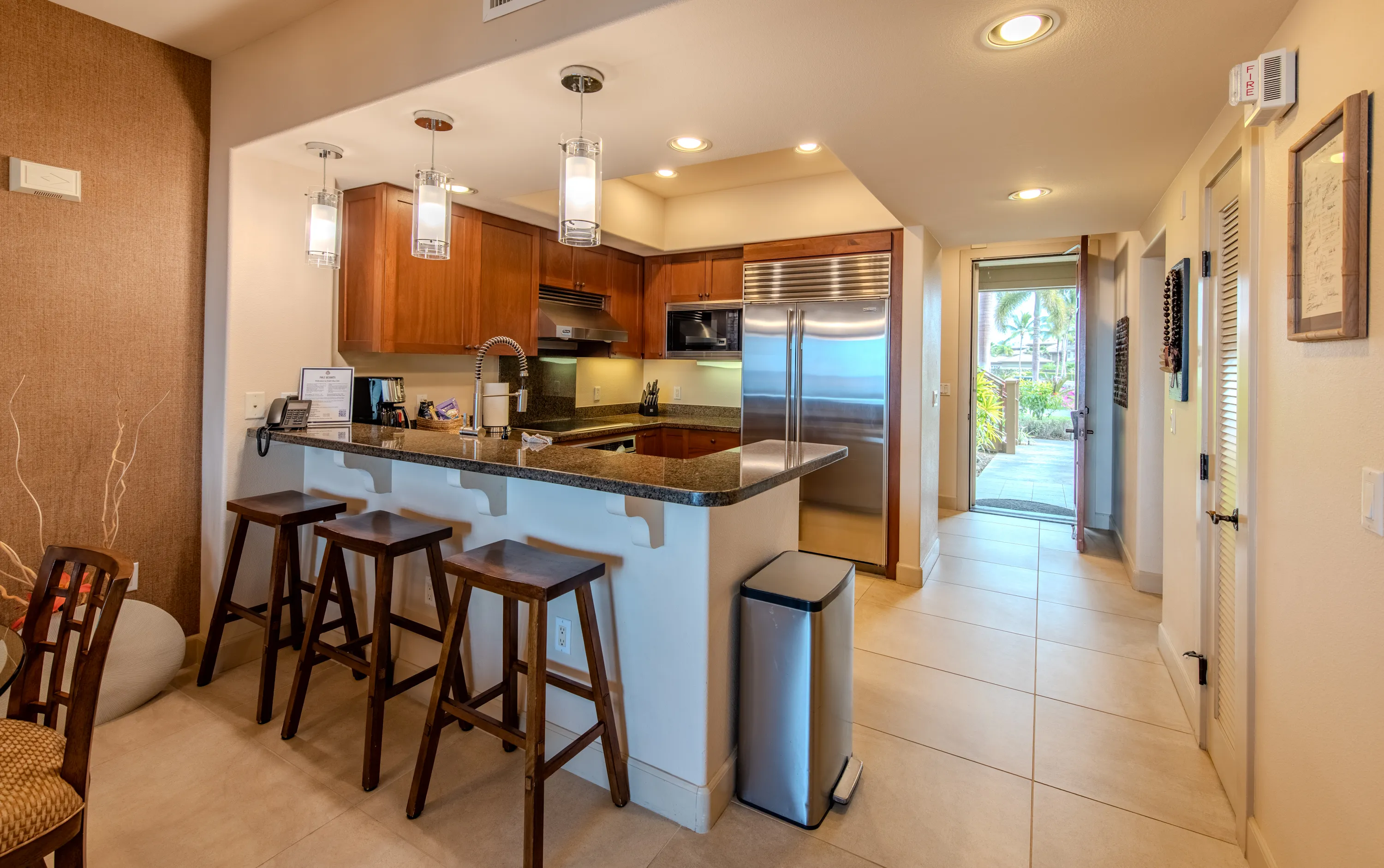 Kitchen with granite breakfast bar, Sub-Zero and Wolf appliances