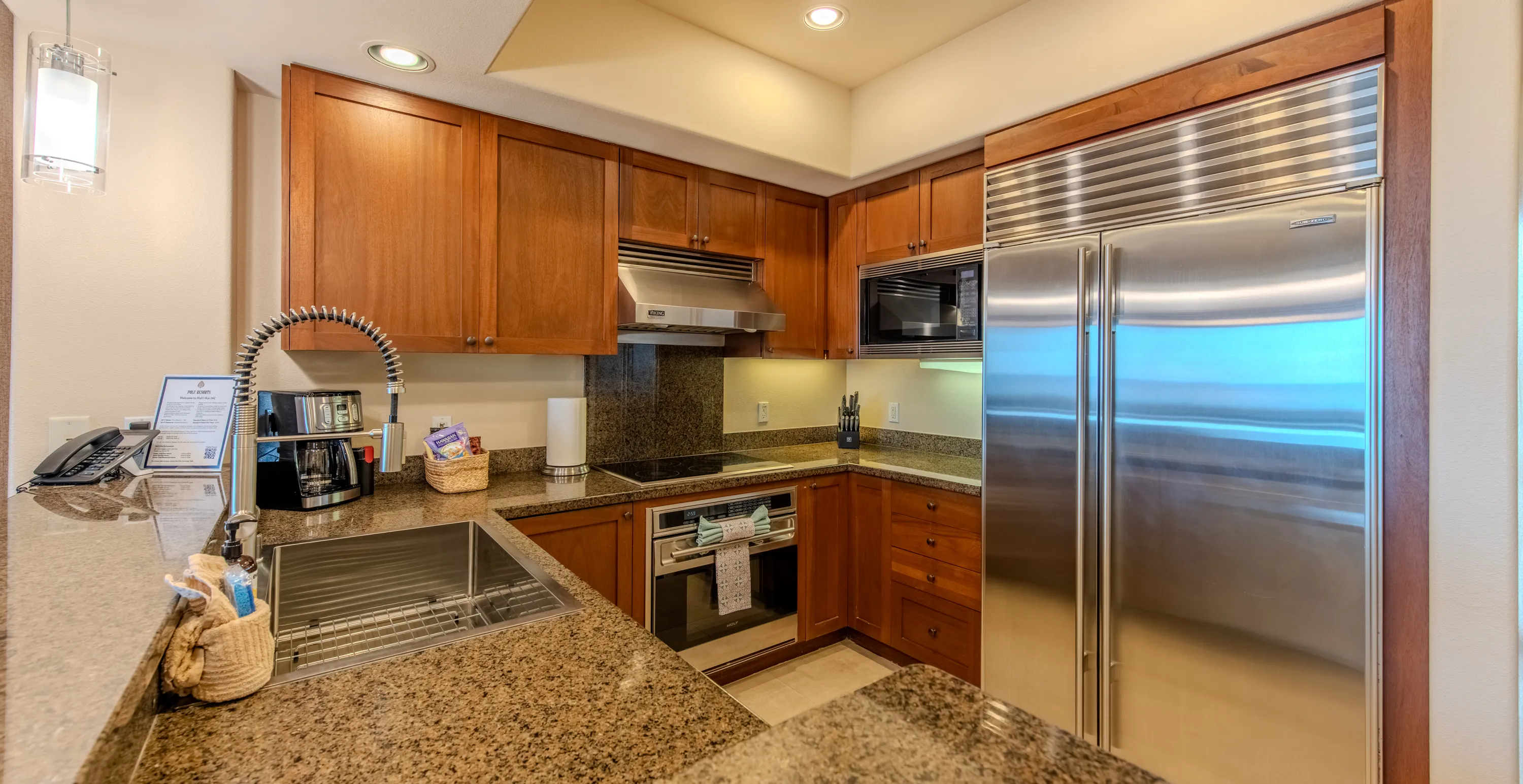 Kitchen with full-size stainless appliances and granite counters