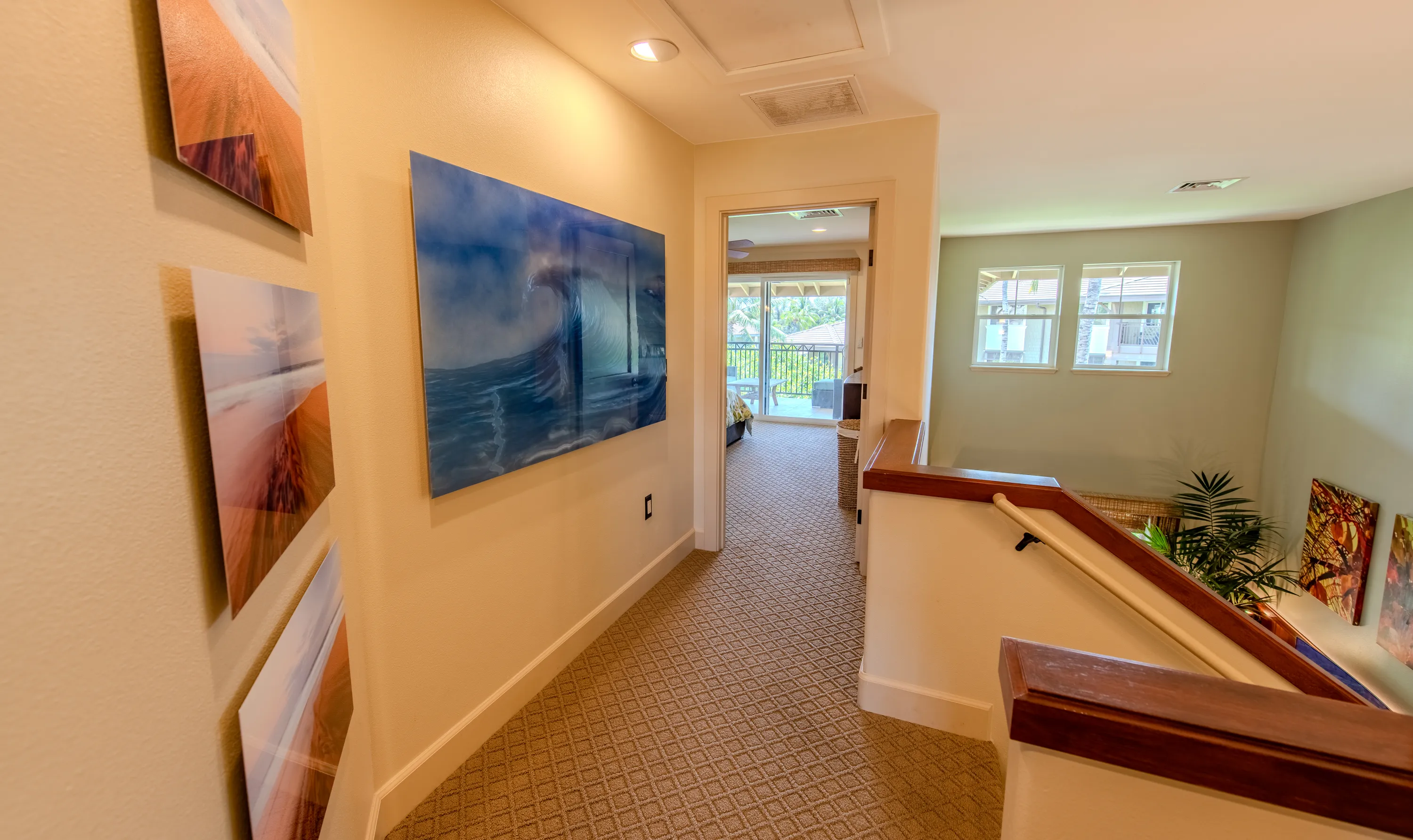 Upstairs loft landing with a second lounge and TV