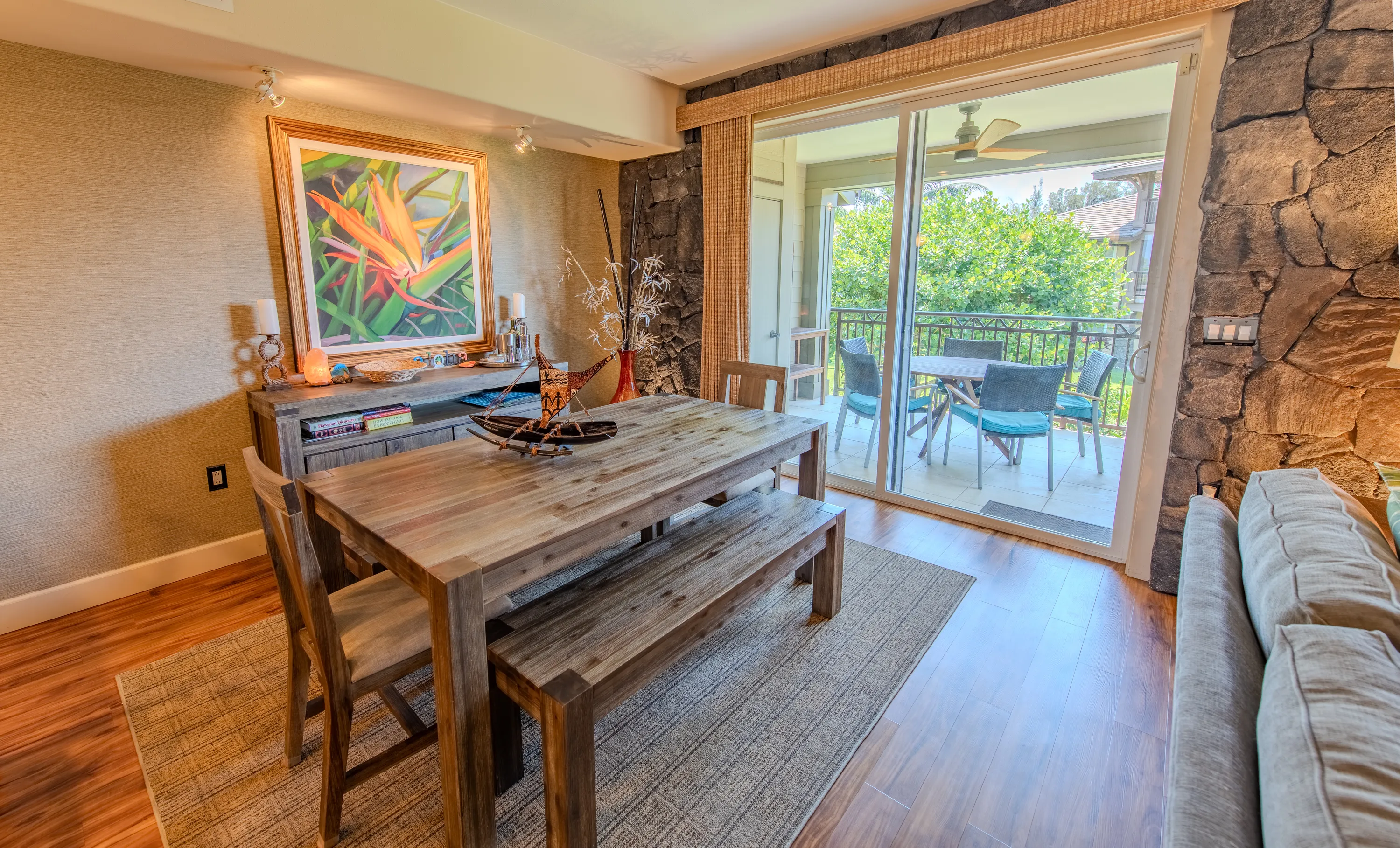 Dining table for six beside the sliding doors to the lanai