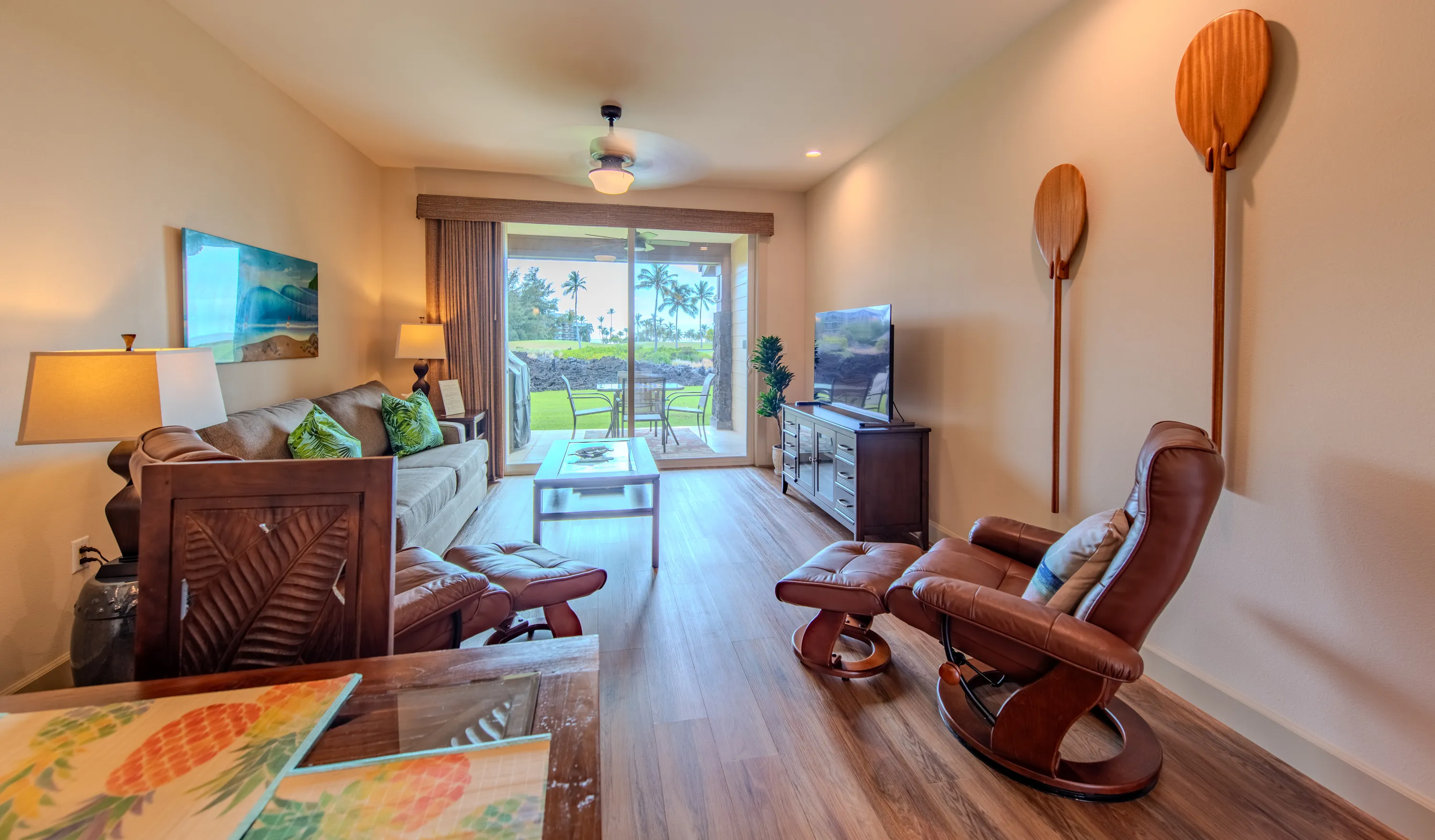 Living area with lounge seating opening to the lanai